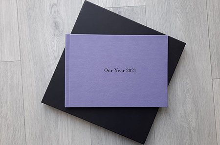 annual family photobook purple cover and presentation box